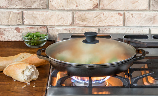 https://bbqetcie.com/cdn/shop/products/Lodge_ChefCollection_CastIronEverydayPanWithGlassLid_12inch_Stove_512x310.jpg?v=1679975941